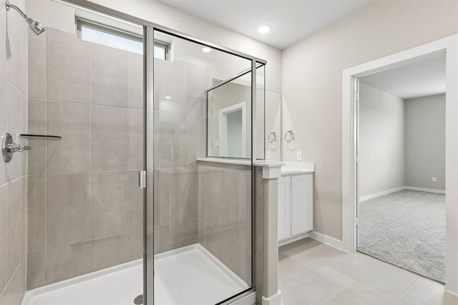 Primary Bathroom in the Winters home plan by Trophy Signature Homes – REPRESENTATIVE PHOTO