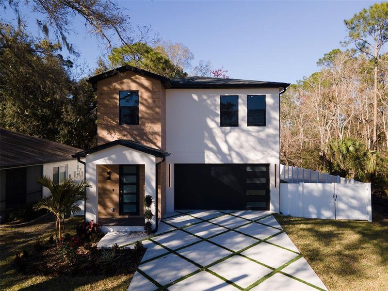 Front exterior of a new home in , Tampa, FL, highlighting curb appeal (Image 29).
