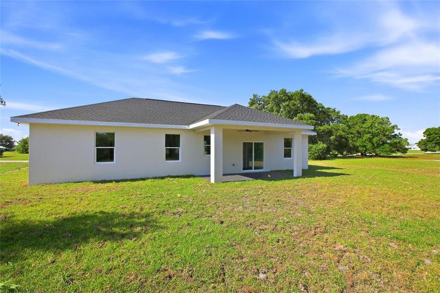 Exterior details and patio area of a home in , Sebring (Image 3).