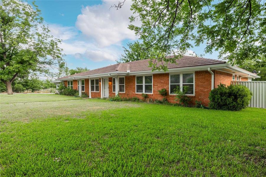Front exterior of a new home in , Coleman, TX, highlighting curb appeal (Image 18). Front exterior of a new home in , Coleman, TX, highlighting curb appeal (Image 18).