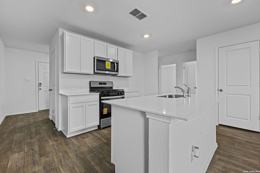 Furnished interior view inside a new home in Avenida, Converse (Image 8).