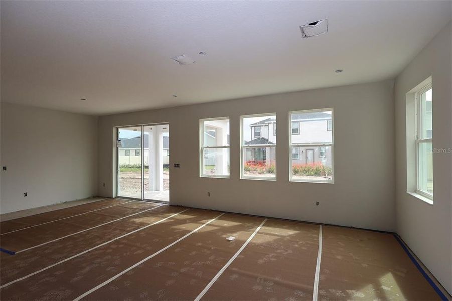 In-progress construction of a new home in Center Lake on the Park, St. Cloud, FL (Image 14).