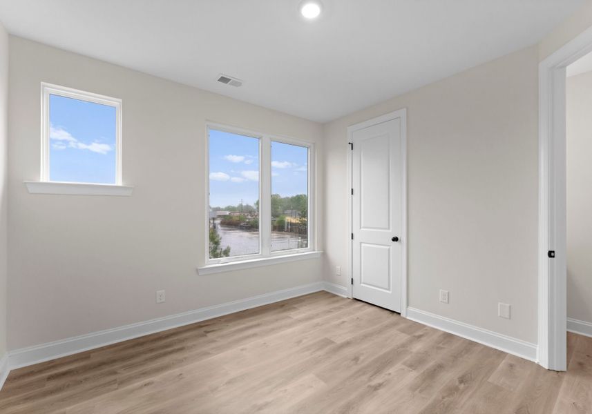 Spacious, unfurnished interior of a new home in Hartford Townhomes, Charlotte (Image 22).