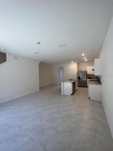 Spacious, unfurnished interior of a new home in Atria at Ridgewood Lakes, Davenport (Image 6).