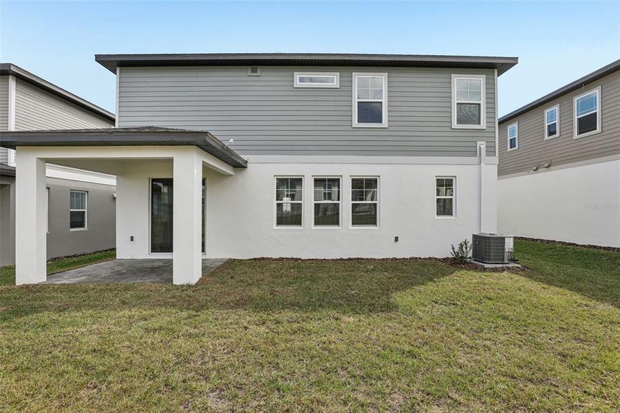 Exterior details and patio area of a home in Cyrene at Minneola, Minneola (Image 29).