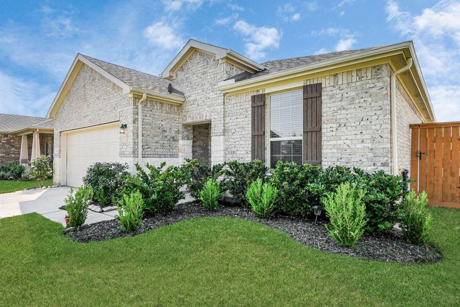 Front exterior of a new home in Marvida, Cypress, TX, highlighting curb appeal (Image 27).