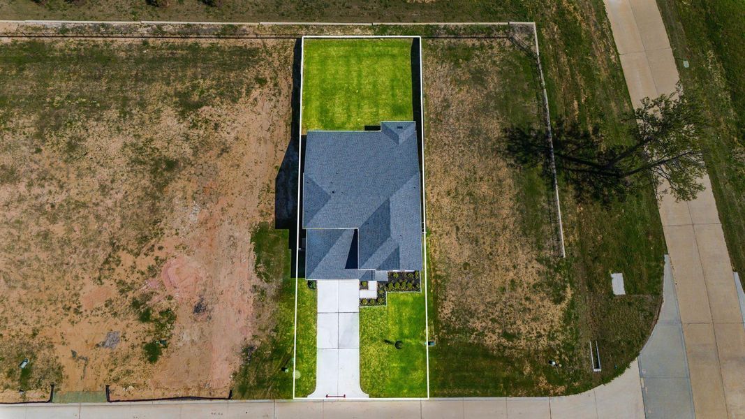 This home sits on a large lot with ample yard space in front and the back, lush landscaping and well-maintained yard! This home sits on a large lot with ample yard space in front and the back, lush landscaping and well-maintained yard!