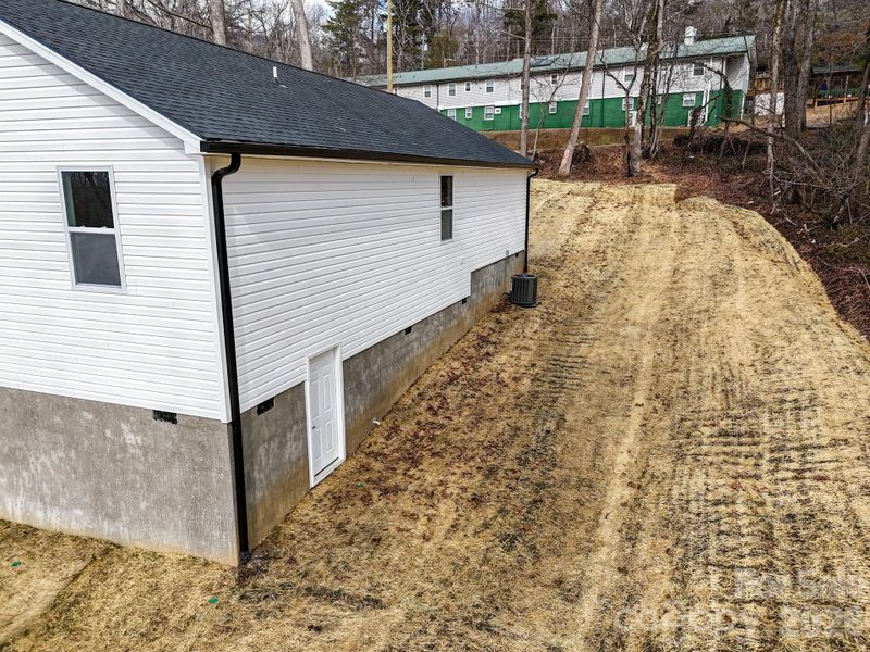 Exterior details and patio area of a home in , Black Mountain (Image 25). Exterior details and patio area of a home in , Black Mountain (Image 25).