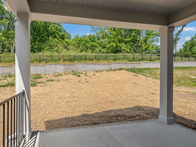 Exterior details and patio area of a home in Woods Crossing, Gallatin (Image 27).