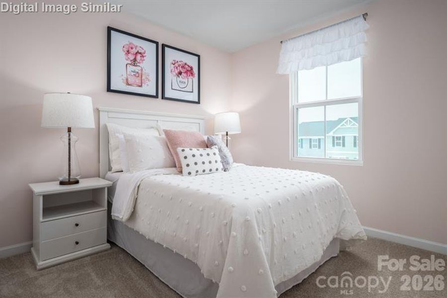 This adorable bedroom is a dream come true for any little girl — warm, inviting, and full of personality.