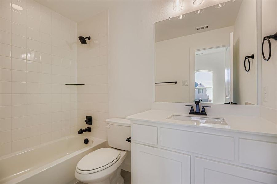 Full bath with bathing tub / shower combination and vanity Full bath with bathing tub / shower combination and vanity