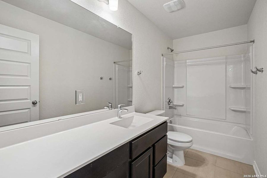 Furnished interior view inside a new home in Medina Crossing, Von Ormy (Image 10).