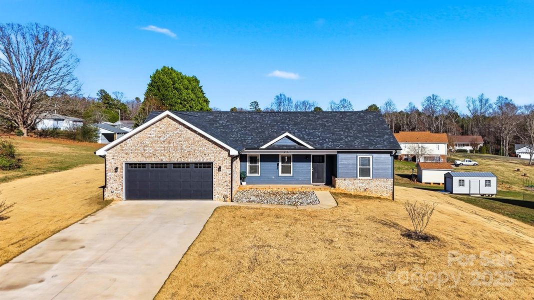 Front exterior of a new home in , Granite Falls, NC, highlighting curb appeal (Image 22).