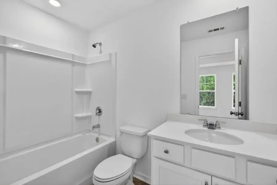 Furnished interior view inside a new home in Chandler Run, Tucker (Image 11).