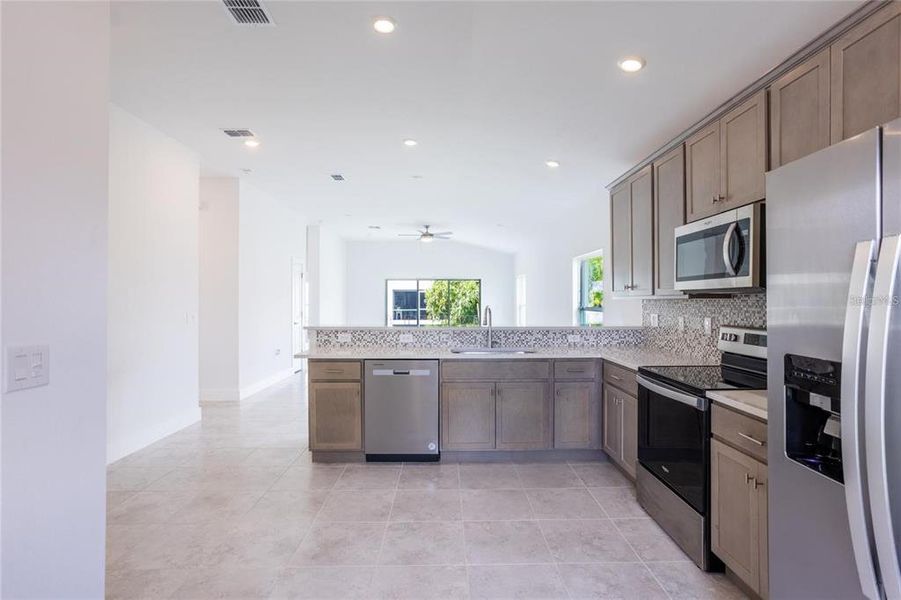 Furnished interior view inside a new home in , Port Charlotte (Image 4).