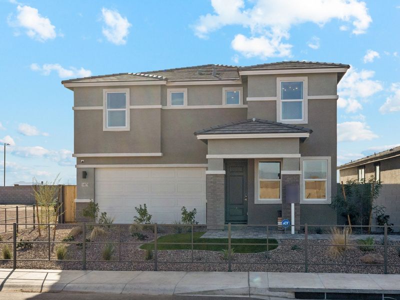 A house with a fence around it.