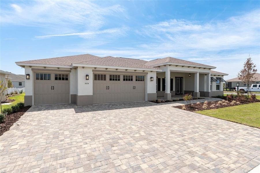 Front exterior of a new home in , Ocala, FL, highlighting curb appeal (Image 27).