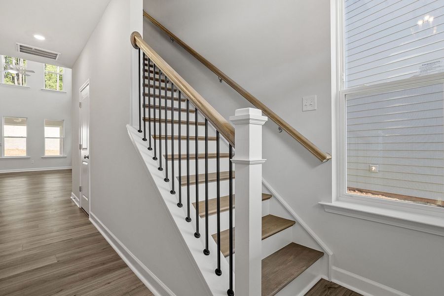 Spacious, unfurnished interior of a new home in Ovation at Sweetbrier, Durham (Image 15).