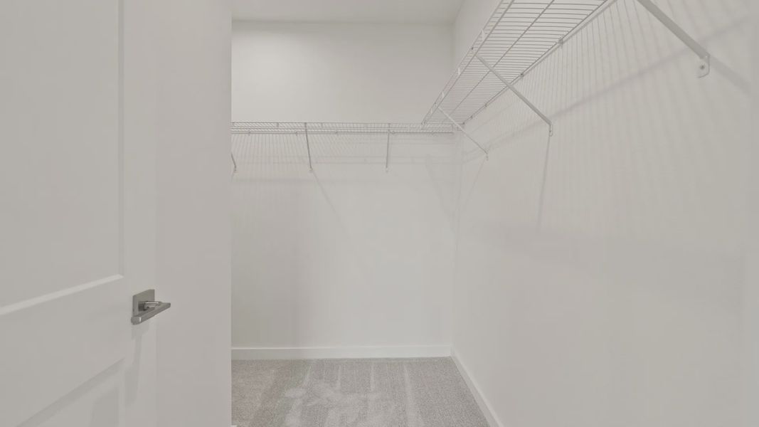Furnished interior view inside a new home in Grasslands West, Lakeland (Image 31).