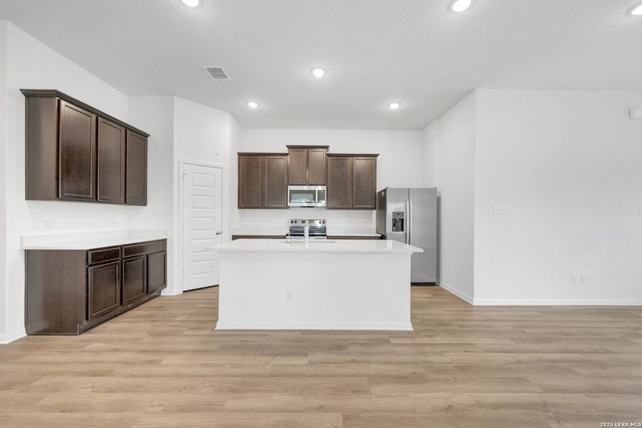 Furnished interior view inside a new home in Cinco Lakes, San Antonio (Image 9).