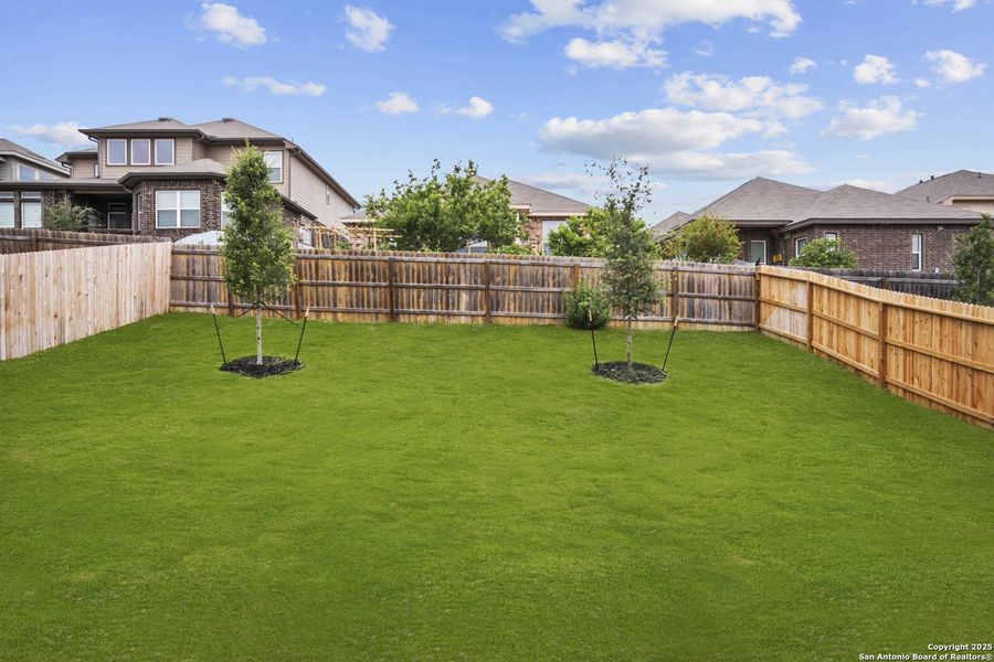 Front exterior of a new home in Comanche Ridge, San Antonio, TX, highlighting curb appeal (Image 17). Front exterior of a new home in Comanche Ridge, San Antonio, TX, highlighting curb appeal (Image 17).