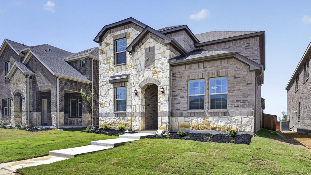 Representative exterior photo of a completed home built from the Selma by D.R. Horton in Lilybrooke at Legacy Hills, Celina, TX (Image 2). Representative exterior photo of a completed home built from the Selma by D.R. Horton in Lilybrooke at Legacy Hills, Celina, TX (Image 2).