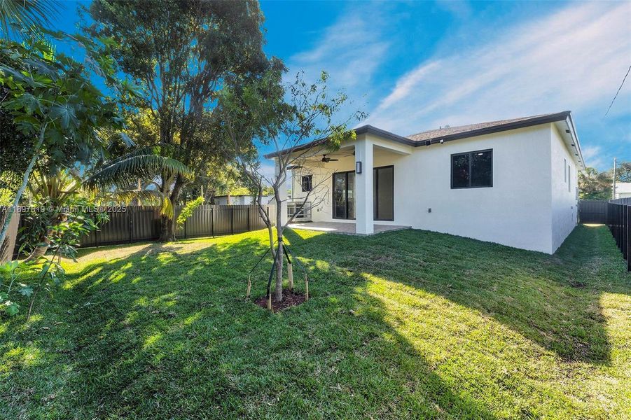 Exterior details and patio area of a home in , North Miami (Image 4).