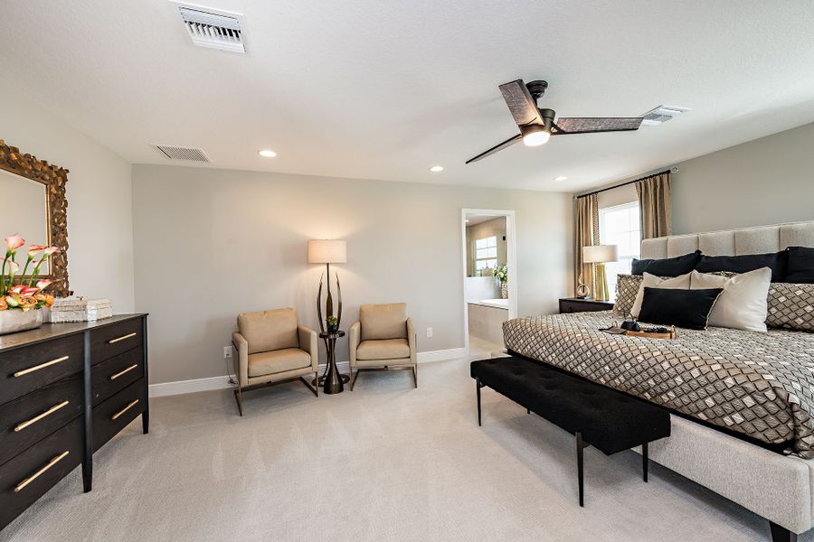 Representative furnished interior of a home built from the Pelican by Homes by WestBay in Crosswind Ranch, Parrish (Image 45).