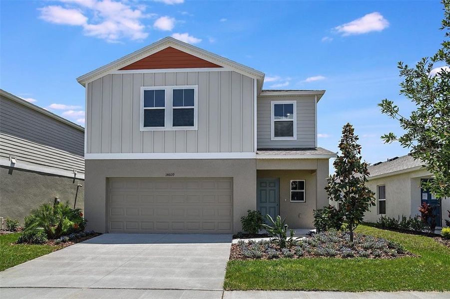 Front exterior of a new home in Scenic Terrace, Lake Hamilton, FL, highlighting curb appeal (Image 1).