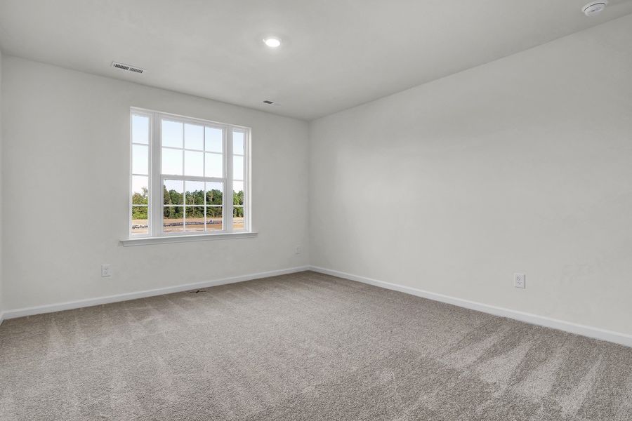 Spacious, unfurnished interior of a new home in Grand Park, Leland (Image 18). Spacious, unfurnished interior of a new home in Grand Park, Leland (Image 18).