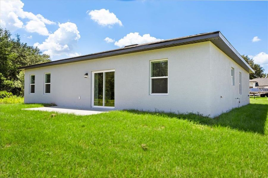 Exterior details and patio area of a home in , Ocala (Image 4).
