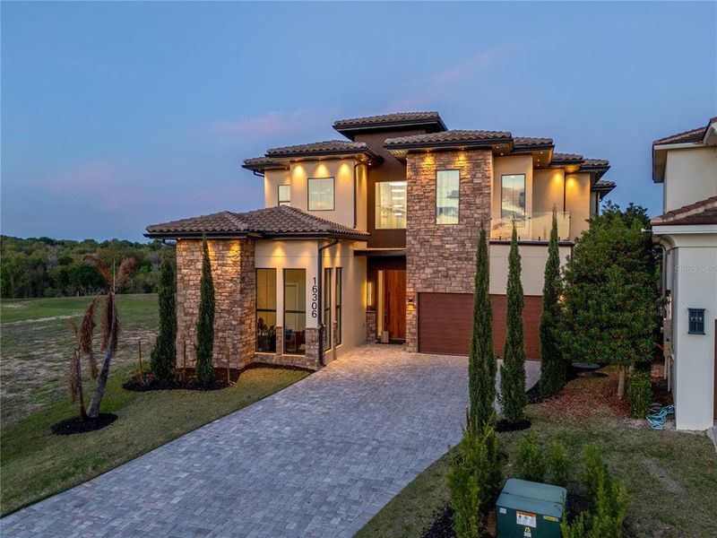 Front exterior of a new home in , Montverde, FL, highlighting curb appeal (Image 25).