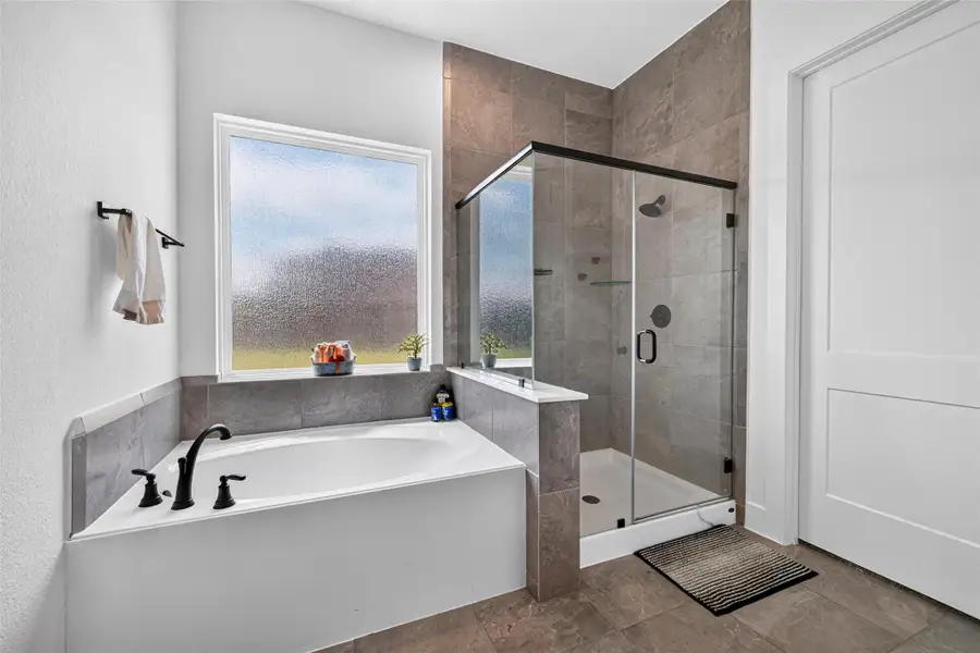 Furnished interior view inside a new home in , Iowa Colony (Image 24).