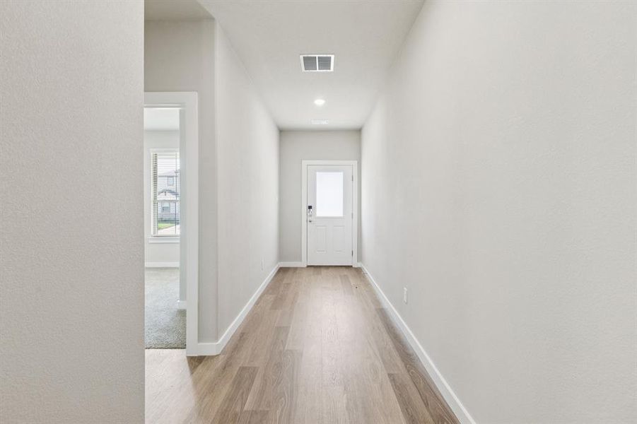 Entryway in the Stanley II home plan by Trophy Signature Homes – REPRESENTATIVE PHOTO