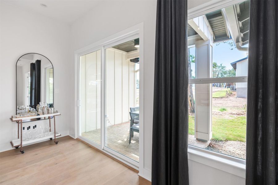 Detailed view of wood finished floors. The photos shown are of a completed home with the same floor plan and may not reflect the exact finishes, features, or layout of the home currently under construction.