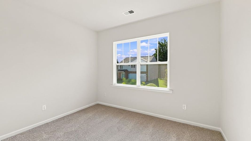 Spacious, unfurnished interior of a new home in Durbin Meadows Traditions, Fountain Inn (Image 14).