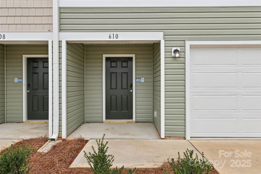 Exterior details and patio area of a home in The Towns at Green Needles, Lexington (Image 3).