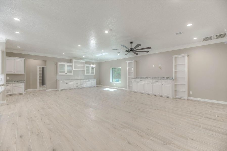 Living room with great natural lighting and plenty of cabinet space(Building A) Living room with great natural lighting and plenty of cabinet space(Building A)