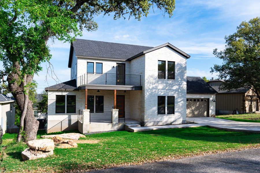 Welcome to the Texas Hill Country, white Limestone exterior with tongue and groove ceiling on front porch. Welcome to the Texas Hill Country, white Limestone exterior with tongue and groove ceiling on front porch.