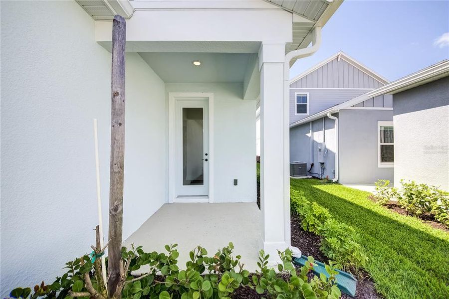 Exterior details and patio area of a home in Bungalow Walk at Lakewood Ranch, Sarasota (Image 24).