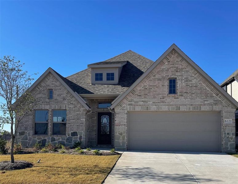 Front exterior of a new home in Mercer Meadows, Royse City, TX, highlighting curb appeal (Image 1).