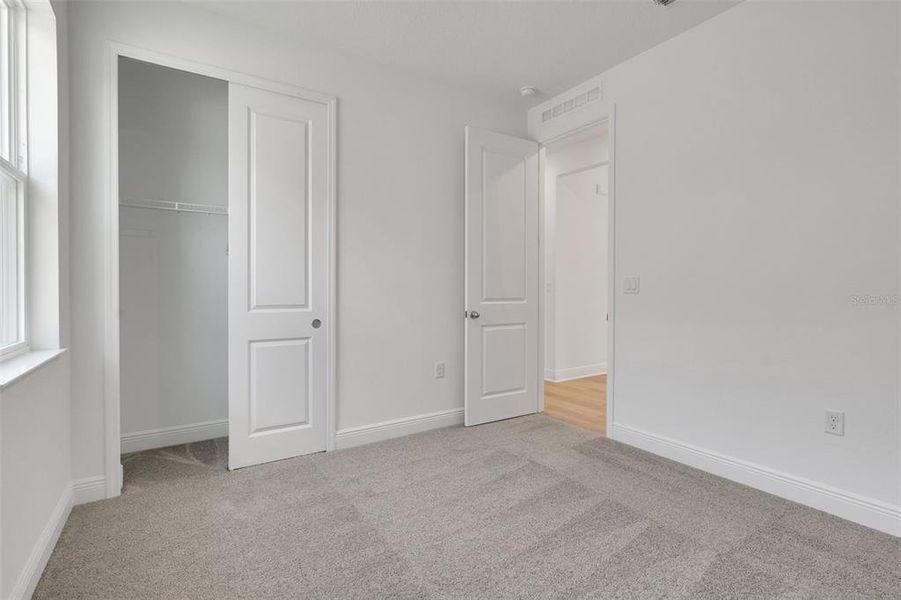 Spacious, unfurnished interior of a new home in Reserve at Hammock Oaks, Lady Lake (Image 37).