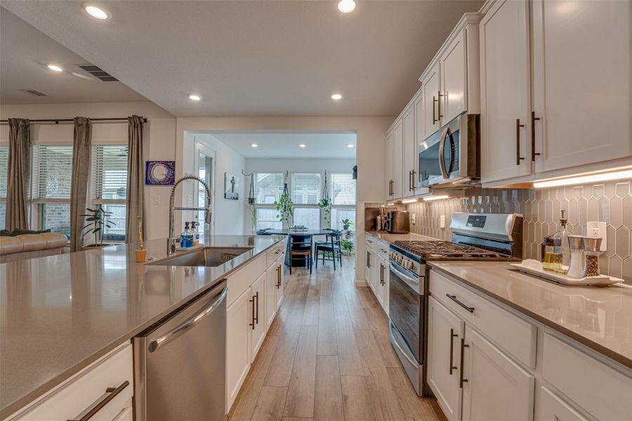 Furnished interior view inside a new home in ARTAVIA: Fairway Collection, Conroe (Image 13).