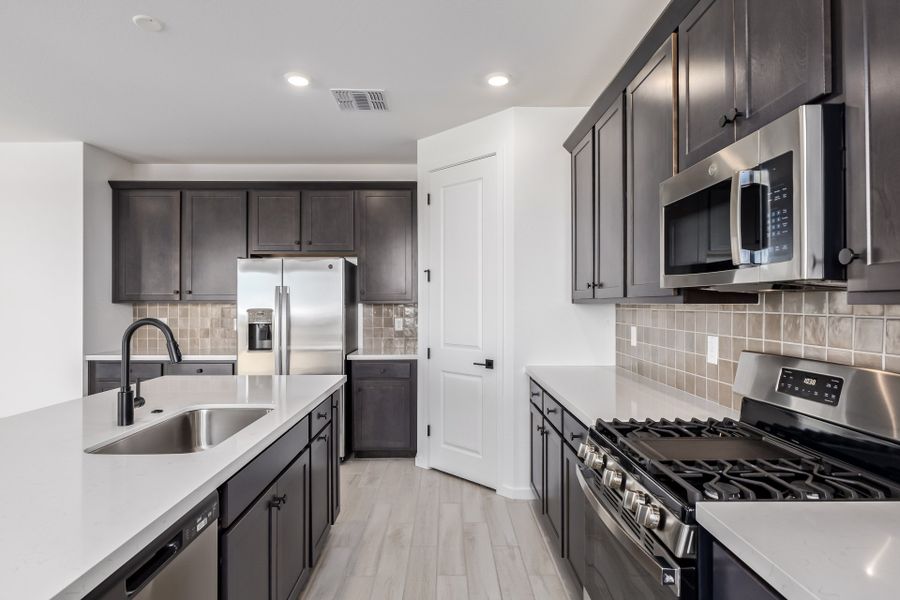 Furnished interior view inside a new home in Frontera, Surprise (Image 3).