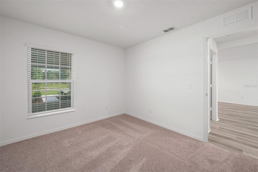 Spacious, unfurnished interior of a new home in Gum Lake Preserve, Lake Alfred (Image 20).