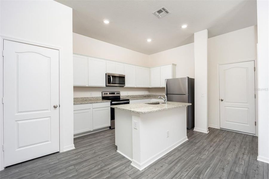 Furnished interior view inside a new home in Sol Vista, Dundee (Image 4).