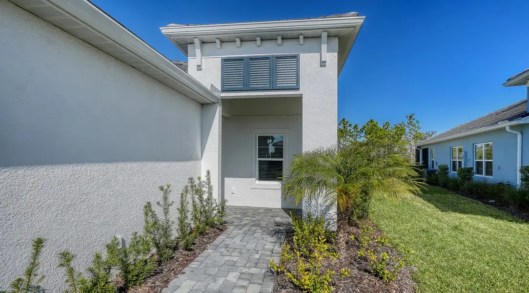 Exterior details and patio area of a home in Grand Palm, Venice (Image 3).