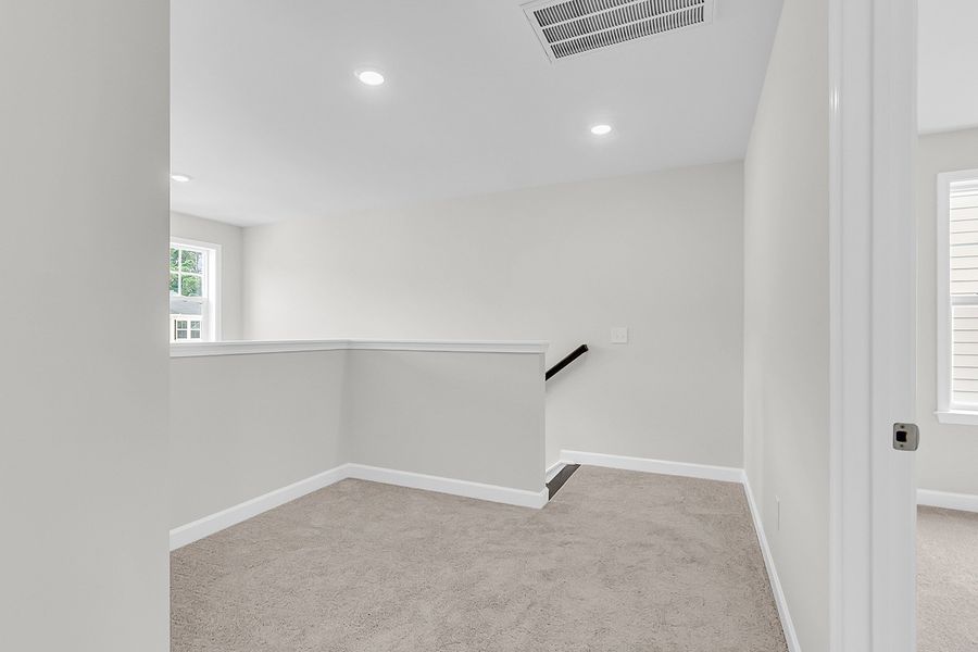 Spacious, unfurnished interior of a new home in Pineland Preserve, Summerville (Image 35).