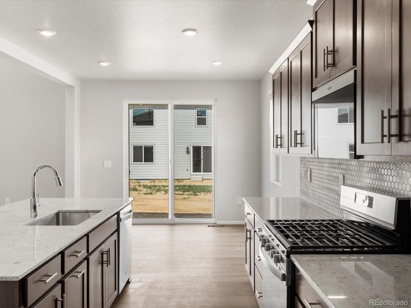 Furnished interior view inside a new home in Poudre Heights: The Alpine Collection, Windsor (Image 10).