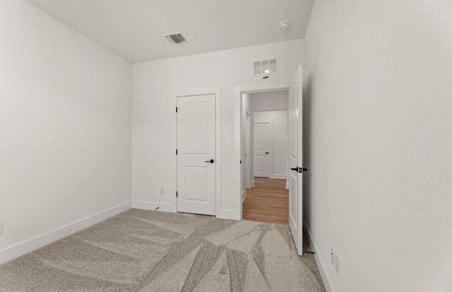 Spacious, unfurnished interior of a new home in Saddleback at Santa Rita Ranch, Liberty Hill (Image 26). Spacious, unfurnished interior of a new home in Saddleback at Santa Rita Ranch, Liberty Hill (Image 26).
